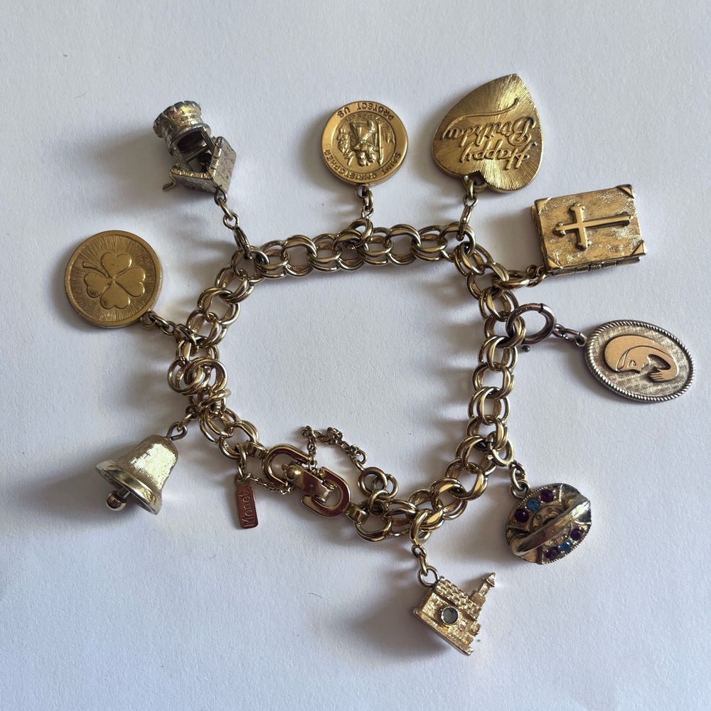 Monet gold tone vintage charm bracelet. Perfect condition.